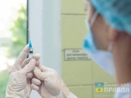 врач